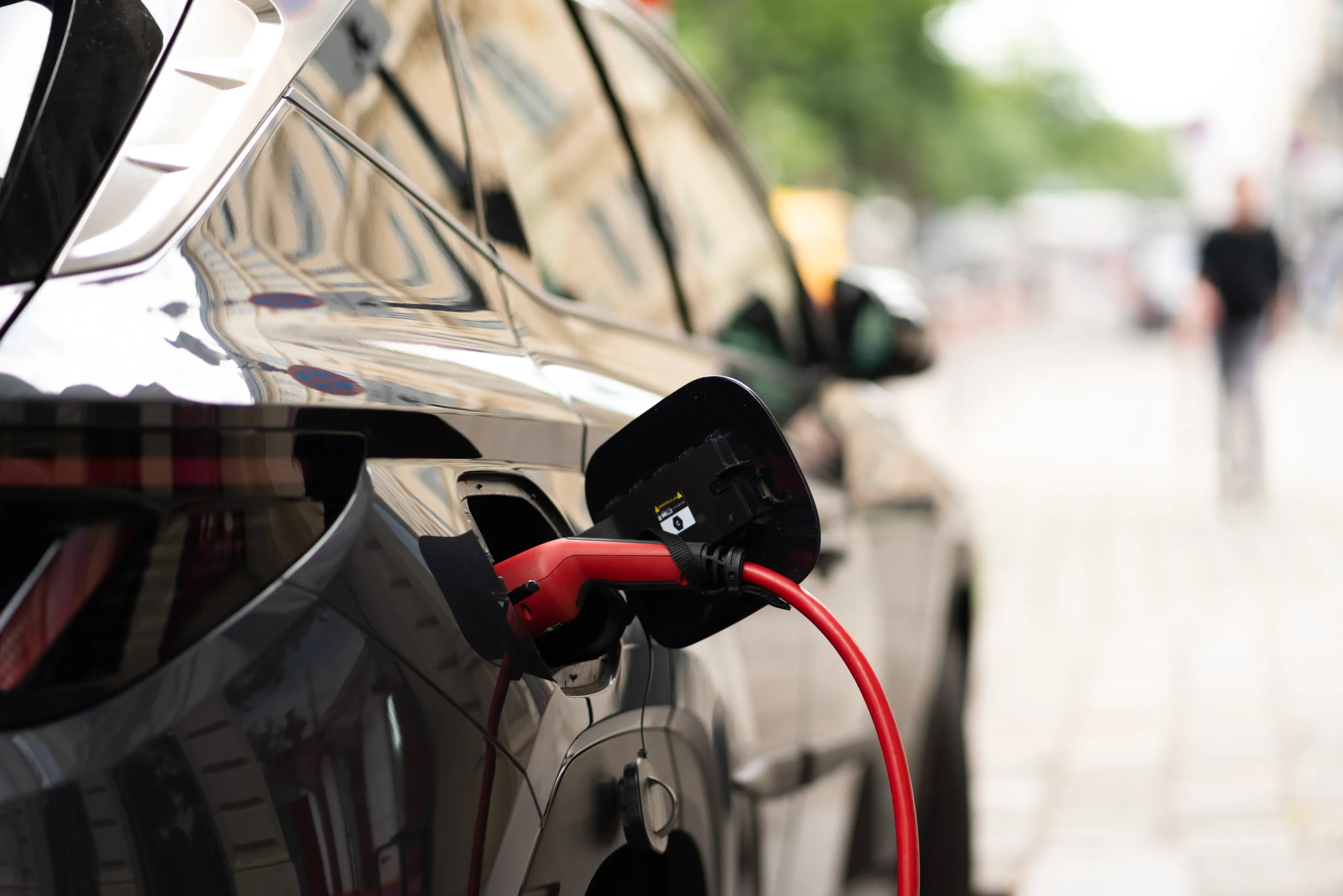ev-car-or-electric-car-at-the-charging-station-2022-06-09-21-48-30-utc